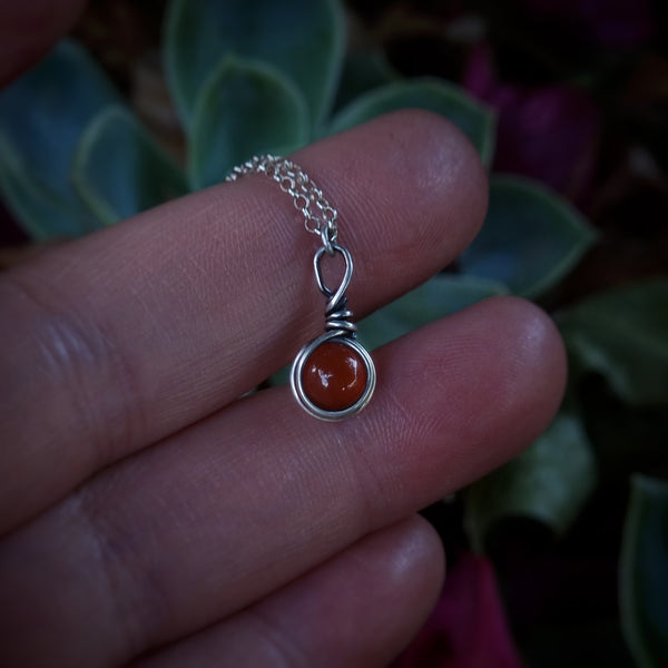 Nova Fire Jewellery Pendant - Deep Orange Carnelian Droplet Gemstone in Antiqued Sterling Silver Wire - Handcrafted, Wire Wrapped Pendant